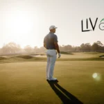 Brooks Koepka standing on lush fairway with warm sunlight and faded LIV Golf logo behind him.