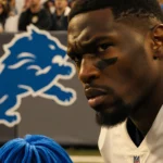 DK Metcalf staring at stunned fan with blurred Steelers player behind and blue wig on ground in an NFL controversy