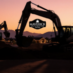 Excavator and bulldozer industrial machinery dig and push earth with long shadows against dusk sky over golf course