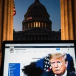 DOJ homepage scrolls to an empty space with erased photo of President Trump while the American flag is hidden