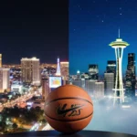 Basketball perched on miniature NBA logo with Las Vegas Strip lights and Seattle skyline below night stars glimmering