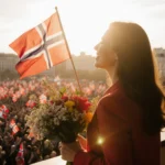 Maria Corina Machado stands on balcony with a bouquet of Norwegian flags and flowers amid a cheering crowd