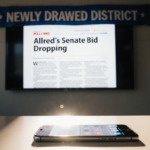 Smartphone screen showing headline about Allred