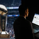 Diego Pavia stands at podium with warm light and split screen showing empty Heisman Trophy and laptop apology post behind him