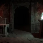 Ancient altar with mysterious symbols stands beside glowing crystal artifact in dim temple entrance with red lanterns