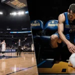 Cooper Flagg sits on Mavericks bench with bandaged ankle and Nuggets coach gesturing across empty court