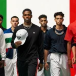 Diverse group of men walking toward camera with athletic wear and Italian flag colors in background