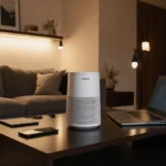 Netgear Orbi 770 Series router sits on coffee table with laptops and phones connected in warm-lit minimalist living room