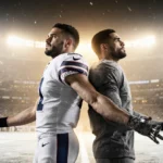 White jersey football player extends arms with determination while grey jersey rival looks up in the glow of playoff stadium