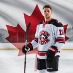 Thomas Harley stands confidently with hockey stick near Canadian flag and snowy backdrop